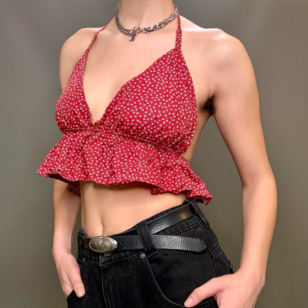 Reworked thrifted red floral halter top with ruffle detailing.